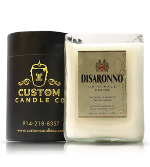The Recycled Italian Liqueur Bottle Candle—a natural soy candle in a glass holder labeled "Disaronno Originale"—makes a unique addition to your personalized Custom Candle collection from Custom Candle Co.