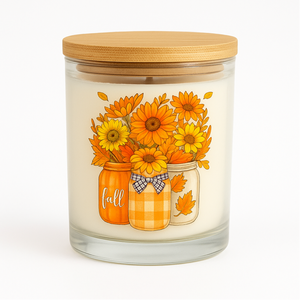 The Fall Harvest Candle is a hand-poured glass jar candle with a wooden lid, featuring an illustration of three jars filled with orange and yellow flowers and autumn decorations, adding cozy seasonal charm to any room.