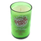 The Recycled Ginger Ale Soda Candle is a soy candle in a green glass container made from a repurposed Canada Dry bottle, featuring its iconic label and wick—a unique decor piece for any space.