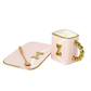 The 3D Design Handbag Shaped Ceramic Coffee Cups Set includes a pink candle in a square holder with gold accents, matching rectangular tray, and gold spoon—making it an ideal decorative and practical gift for any stylish space.