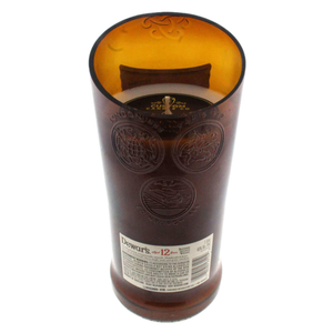 The Recycled Blended Scotch Whiskey Candle - Curved Cut is crafted from an upcycled Scotch whisky bottle and features original branding—an eco-friendly choice for whiskey lovers.
