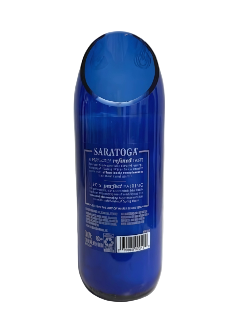A blue glass Recycled Still Spring Water Bottle Candle viewed from the back, displaying its product info—great for upcycling into a customizable scented or eco-friendly soy candle.