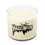 The 3 Wick Clear Tumbler Halloween Candle features a white wax in a clear glass jar with "Halloween" and black bats on the front—an ideal festive scented candle for Halloween lovers.