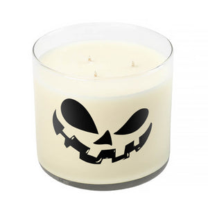 The 3 Wick Clear Tumbler Halloween Candle with Scary Pumpkin (Face #2) is a white soy wax candle in a clear jar, featuring a black jack-o'-lantern face design for a clean, long-lasting burn.