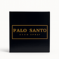 A black box labeled "Palo Santo Box Set" in gold text, set against a plain white background.