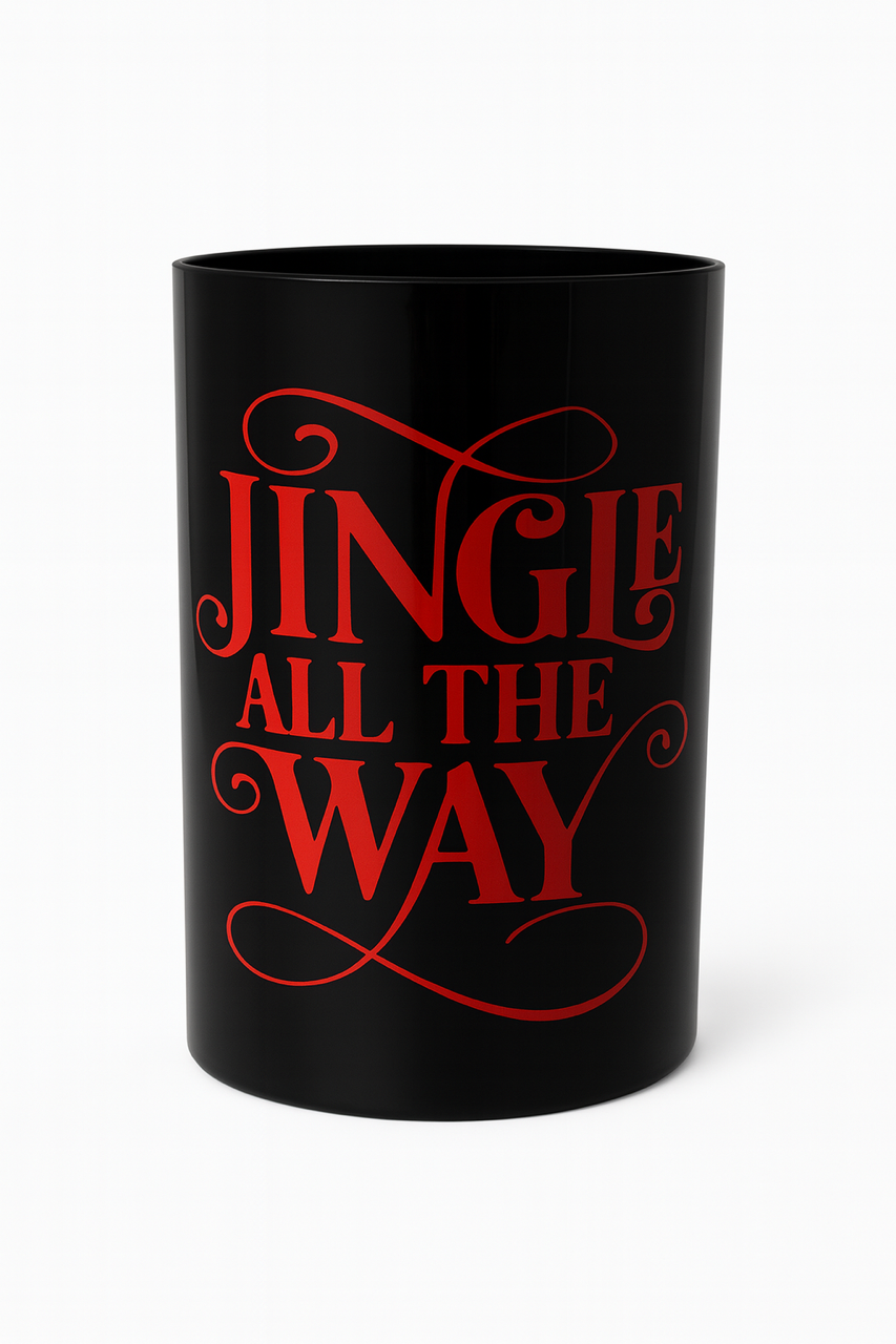 The "Jingle All The Way" 3 Wick Candle is a festive black candle with bold red decorative lettering, ideal for adding holiday cheer to your home or gifting to someone special.