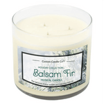 The Musical Holiday Candle – Balsam Fir is a white three-wick candle in a clear glass jar from Custom Candle Co's Holiday Collection, offering a festive balsam fir scent paired with charming musical features.