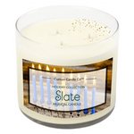 The Musical Holiday Candle – Slate Hanukkah is a white three-wick natural soy candle in a glass jar with a menorah label, ideal for Hanukkah or as part of our Musical Holiday Candles collection.