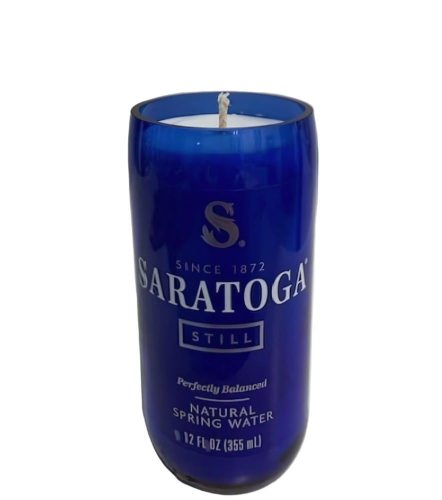 The Recycled Still Spring Water Bottle Candle features a blue repurposed bottle with an eco-friendly soy candle, visible wick, and white wax inside.