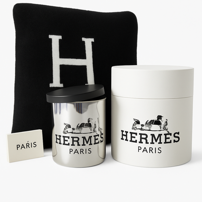The Paris Designer Gift Set includes a Hermès candle in a silver holder, logo box, card, and "H" pillow—perfect for an elegant gift or pairing with a cozy cotton throw.