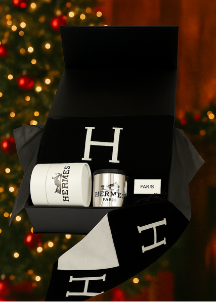 The Paris Designer Gift Set features a black and white scarf, two candles, and a soap bar in an open black box—ideal for custom design baskets or as a luxurious holiday gift set.