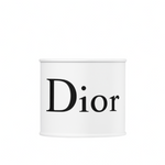 A white cylindrical container labeled "Dior" is centered on a plain white background, resembling the Designer White Paint Can Candle.