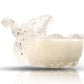 The Sugar Dish Motif Candle features clear glass and a partially open lid, filled with white soy wax, displayed against a white background.