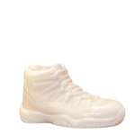 The AJ-11 White Hightop Sneaker Candle – Large (On Backorder) is a hand-poured candle shaped like a high-top sneaker, adding a stylish accent to any room. Displayed against a plain background, it’s perfect for décor enthusiasts and sneaker fans alike.