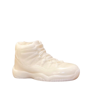 The AJ-11 White Hightop Sneaker Candle – Large (On Backorder) is a hand-poured candle shaped like a high-top sneaker, adding a stylish accent to any room. Displayed against a plain background, it’s perfect for décor enthusiasts and sneaker fans alike.