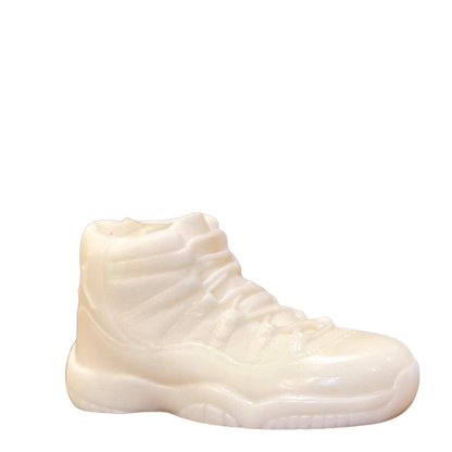 The AJ-11 White Hightop Sneaker Candle – Large (On Backorder) is a hand-poured candle shaped like a high-top sneaker, adding a stylish accent to any room. Displayed against a plain background, it’s perfect for décor enthusiasts and sneaker fans alike.
