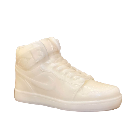 The AJ-1 White Hightop Sneaker Candle – Small (On Backorder) is a hand-poured, all-natural wax candle shaped like a classic white sneaker—ideal as unique décor and displayed against a simple light background.