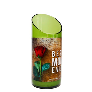 A green glass vase with a slanted rim features a red rose and “BEST MOM EVER” text—perfect to pair with the “Best Mom Ever” Quote Candle.