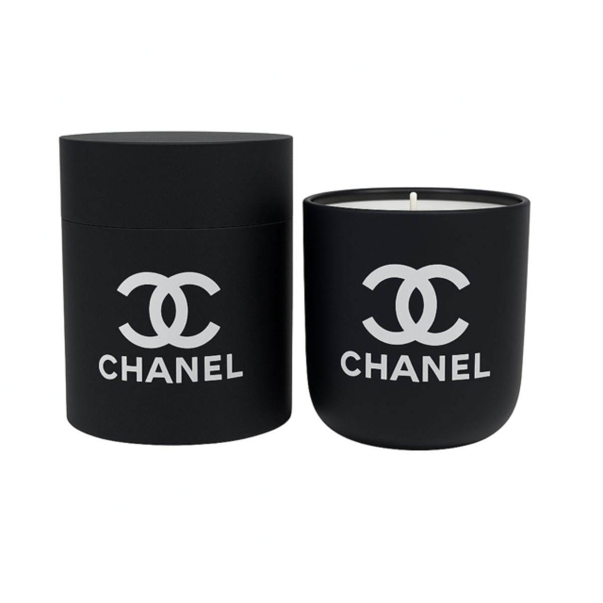 The Black Ceramic Designer Candle sits beside its matching cylindrical container, both in black ceramic and decorated with the white Chanel logo.