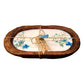 The Blue Floral Wood Candle – Floral Scented features a white soy wax tablet with pressed blue flowers, set on a rectangular wooden tray and finished with a twine-tied tag—ideal for rustic centerpieces.