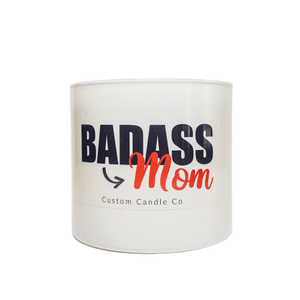 The Badass Mom Candle – 2 Wicks comes in a glass jar labeled “BADASS Mom” and “Custom Candle Co” in bold black and red—an inspiring quote candle that makes the perfect gift for mom.