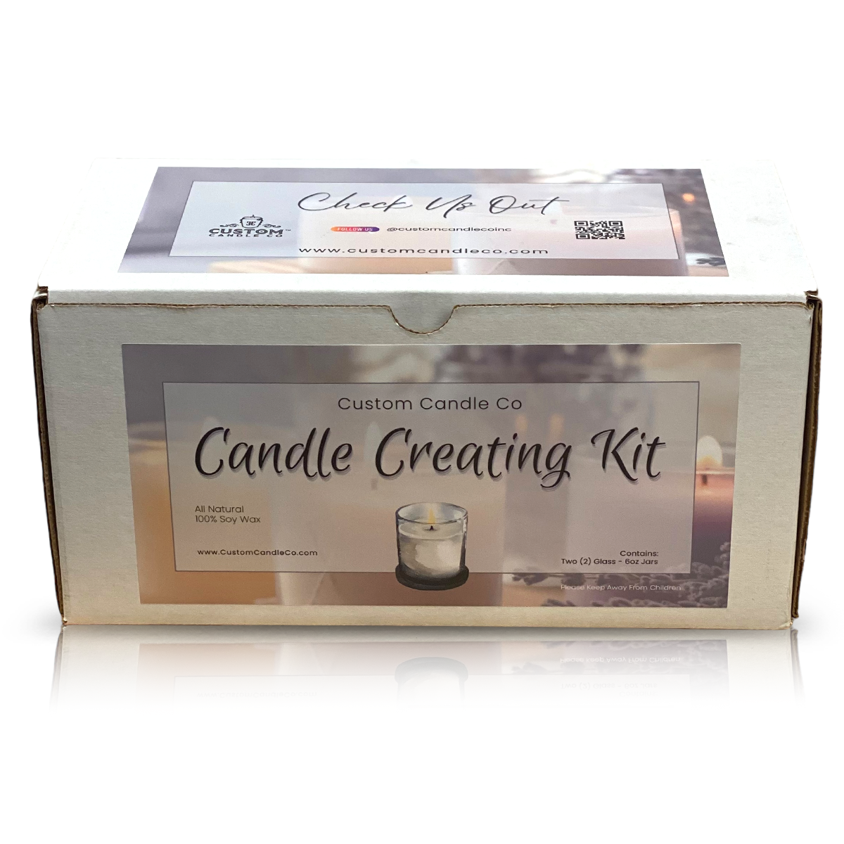 A rectangular box labeled "Candle Creating Kit" from Custom Candle Co, featuring images of custom candles and stating it is an all-natural, 100% soy wax candle making kit.