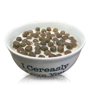 A white quoted bowl labeled "I Cereasly Love You" is filled with Cereal Puffy Coco cereal and milk.