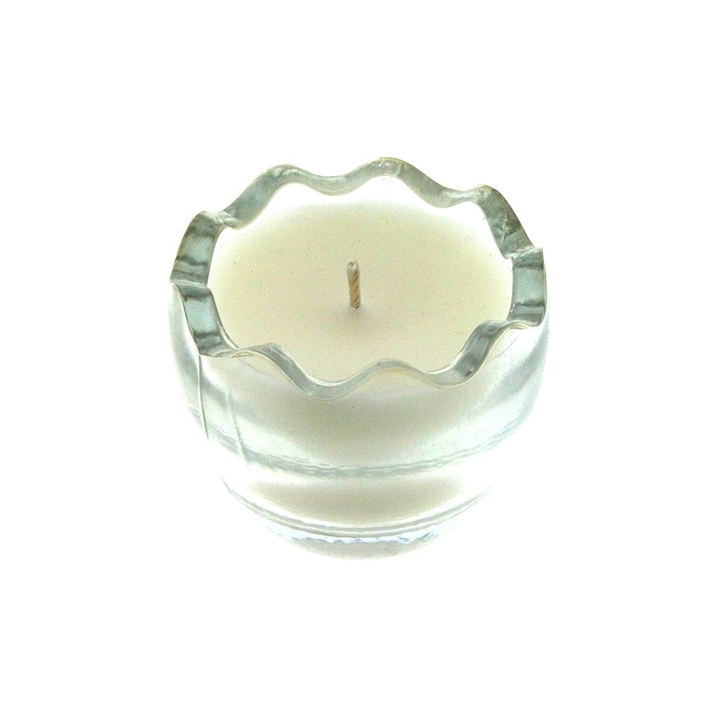 A Clear Glass Easter Egg candle made of white natural wax sits in a clear glass holder with a wavy rim, viewed from above against a white background.