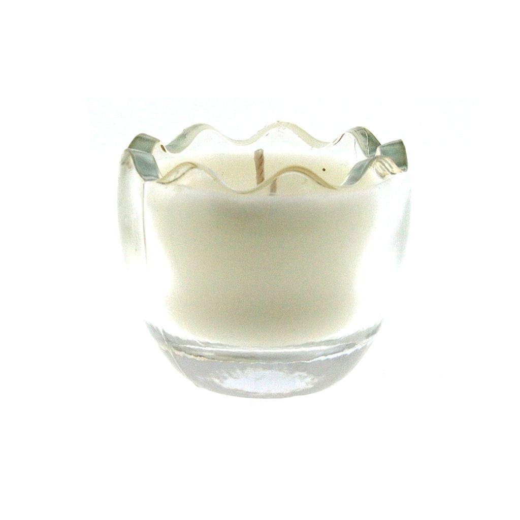 The Clear Glass Easter Egg features a white, egg-shaped candle in a transparent glass holder with a wavy, scalloped rim, displayed against a plain white background.