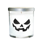 The Clear Tumblr Halloween Candle with Scary Pumpkin (Face #3) features white soy wax in a glass jar with a black pumpkin face design and silver lid—perfect as a spooky Halloween candle.