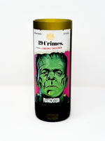 The Recycled Frankenstein Candle is made from a green glass 19 Crimes Cabernet Sauvignon wine bottle with a Frankenstein illustration label, upcycled into a unique recycled bottle candle.