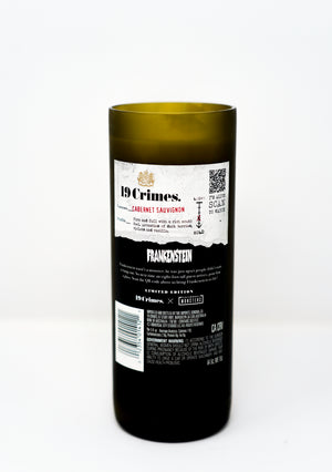 The Recycled Frankenstein Candle is a dark green bottle candle featuring a "19 Crimes Cabernet Sauvignon" and "Frankenstein" label, displayed on a white background.