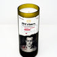 The Recycled Cabernet Sauvignon 2022 Wine Candle is made from a repurposed wine bottle and features a black-and-white portrait label on a white background.