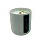 The Holiday Scented Boxed Candle – Frasier Fir Scent features white soy wax in a simple ceramic container with a wooden wick and pine sprig, making it the perfect holiday accent.