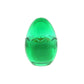 The Green Glass Easter Egg w/ Yoke is an egg-shaped candle crafted from natural wax with a wavy seam around the middle, shown on a white background.