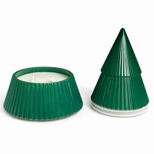 Two green, ribbed, conical Green Ceramic Christmas Tree Candles are shown—one open to reveal a hand-poured three-wick candle inside, the other closed with its pointed lid—a perfect decorative keepsake.