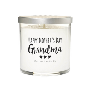 The "Happy Mother's Day, Grandma" Clear Glass Candle, featuring three heart icons, is a white soy candle in a clear jar—an ideal Mother’s Day gift from Custom Candle Co.