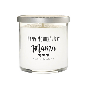 The "Happy Mother's Day, Mama" Clear Glass Candle is a white soy candle in a clear glass jar with a silver lid. The label features three hearts and "Custom Candle Co," making it an ideal personalized Mother’s Day gift.