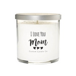 The "I Love You Mom" White Glass Candle features white soy wax in a clear jar with a silver lid. The label displays three hearts and "Custom Candle Co"—a perfect custom gift to express your love to mom.