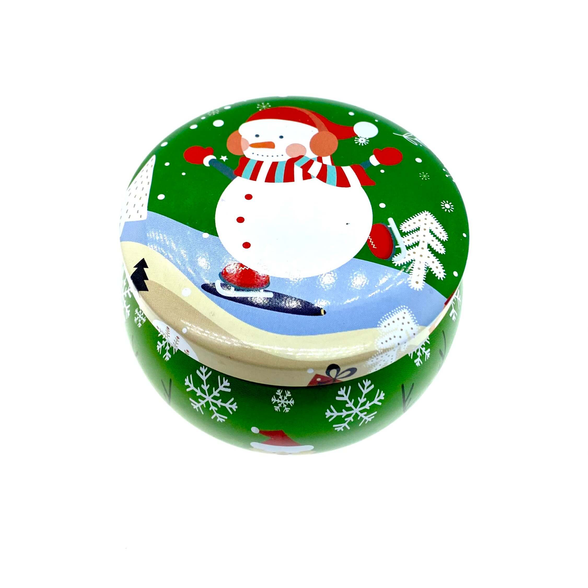 The Green Snowman Holiday Tin Candle – Balsam Scent comes in a festive round green tin with a snowman, snowflakes, and trees in a snowy scene. Crafted from premium soy wax, it features a refreshing balsam fragrance for the holidays.