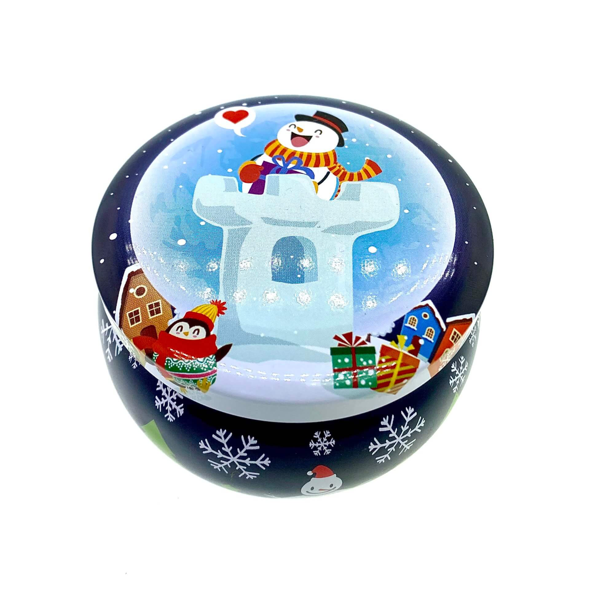 The Dark Blue Snowman Holiday Tin Candle features a festive winter scene with a snowman in a scarf, igloo, houses, presents, and snowflakes. Crafted from soy wax with a Holiday Sparkle scent, it captures the season’s charm.