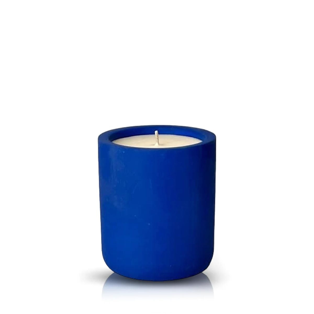 The Intention Blue Candle, a white wax candle in a simple blue cylindrical container, is displayed against a white background—perfect for spiritual rituals or mindful practices.