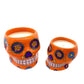 Add festive charm with two Large Orange Ceramic Skull Candles – Nutmeg Scented. Each soy wax candle in a vibrant floral holder is inspired by Day of the Dead designs, perfect for brightening your space.
