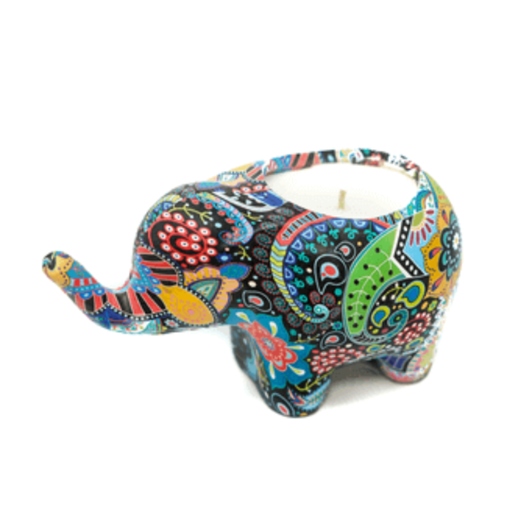 The Mardji the Ceramic Elephant Candle is a vibrant, patterned ceramic elephant candle holder featuring an all-natural soy citronella candle on its back.