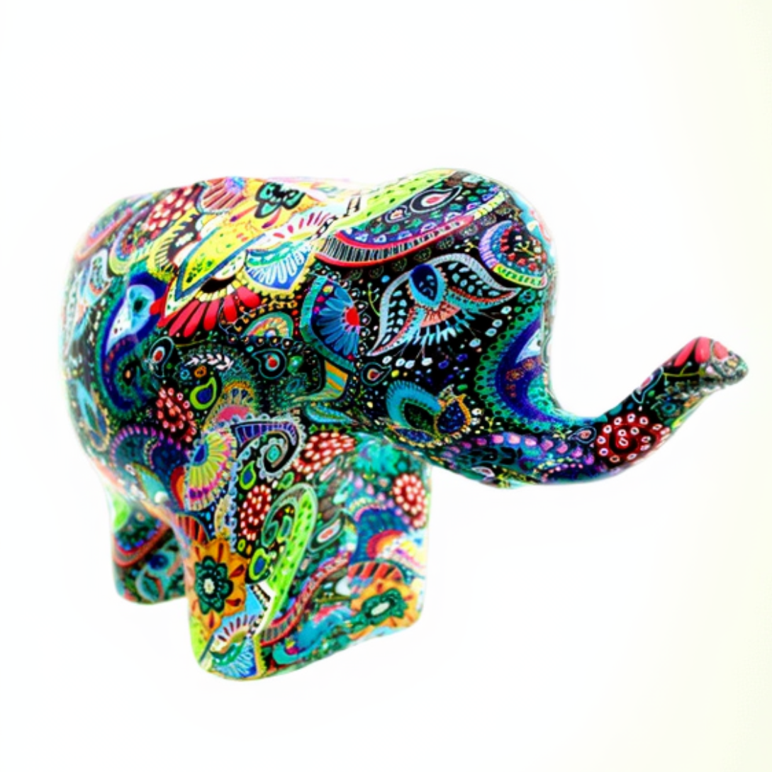 Mardji the Ceramic Elephant Candle, featuring bright colors and intricate patterns, stands against a plain white background.