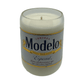 The Recycled Especial Beer Candle is a white, hand-poured candle in a glass made from a recycled Modelo Especial bottle with its original label—an eco-friendly, sustainable choice.