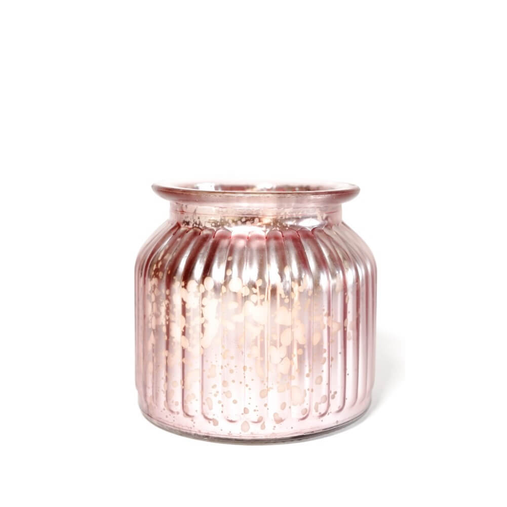 The Mother’s Day Glass Pink Jar with Rose Petals is a metallic pink ribbed glass jar with a wide mouth and speckled pattern, perfect as a Mother’s Day candle or thoughtful gift for mom, shown against a white background.