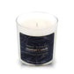 The Musical Love Candle – Amber Romance, a white scented candle in a clear glass jar with scent notes and product details, is the perfect touch for any Valentine’s Day setting against a dark background.