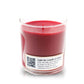 The Musical Love Candle – Fresh Cut Roses is a red scented candle in a clear glass jar, featuring a label with a QR code and text to scan and enjoy custom playlists—ideal for Valentine’s Day or anyone who loves music-inspired candles.