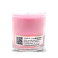 The Musical Love Candle – Love Spell is a pink scented candle in a clear glass jar with a label featuring a QR code that links to a love song playlist—perfect for Valentine’s Day or as part of our exclusive collection.